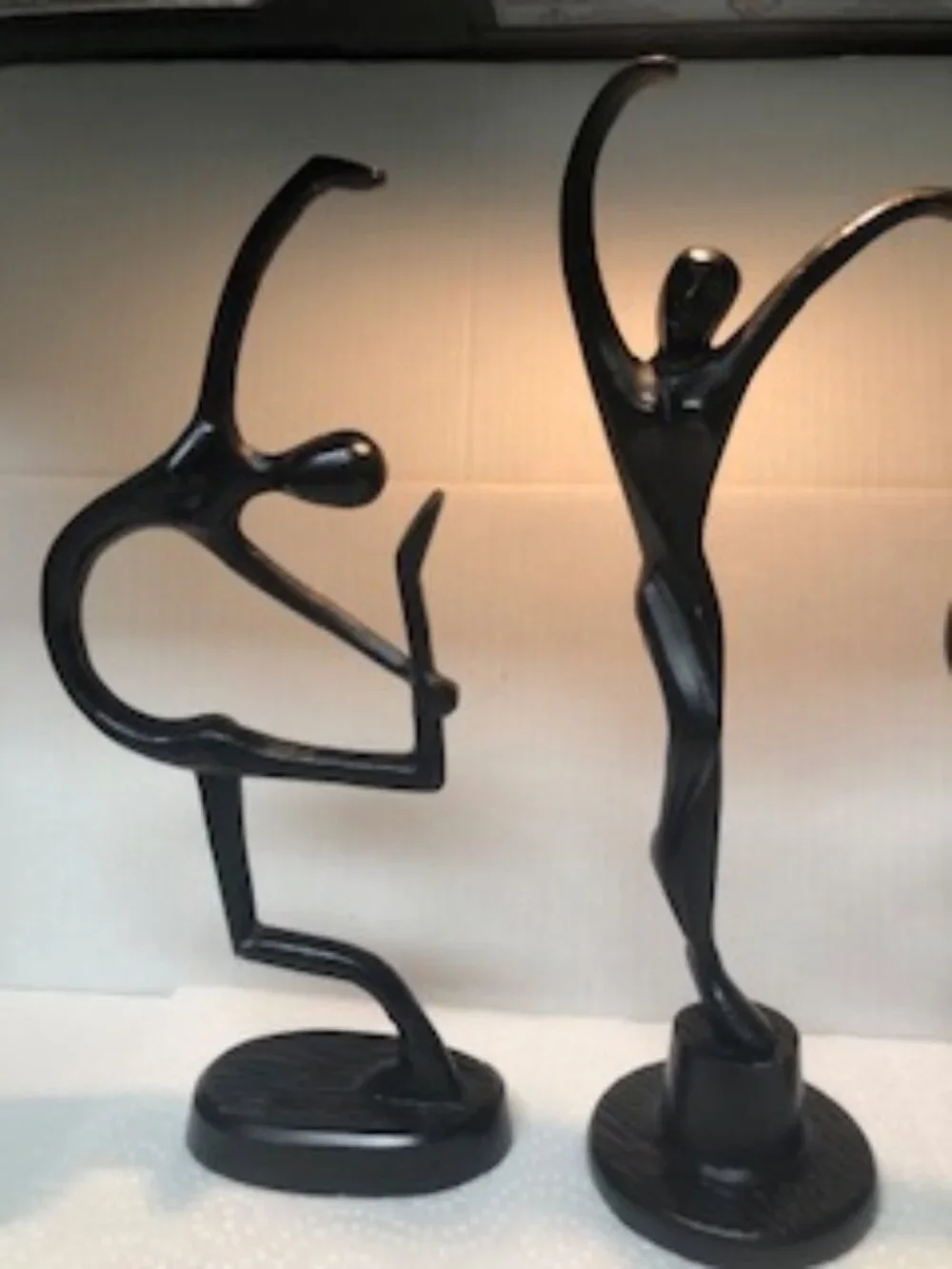 Three dancers female cast metal sculptures designed by Bodrul Khalique for IKEA